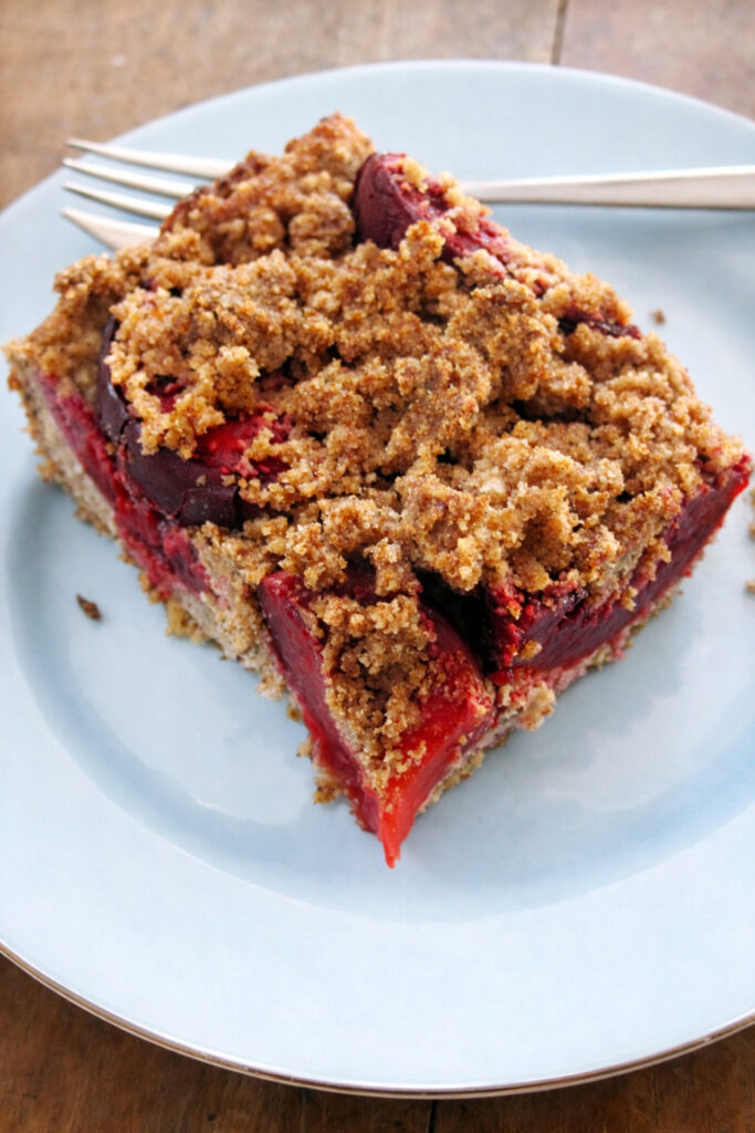 Plum Hazelnut Crumble Cake (Vegan, Gluten-free) 2 Slice of vegan gluten-free plum crumble cake with hazelnut topping.
