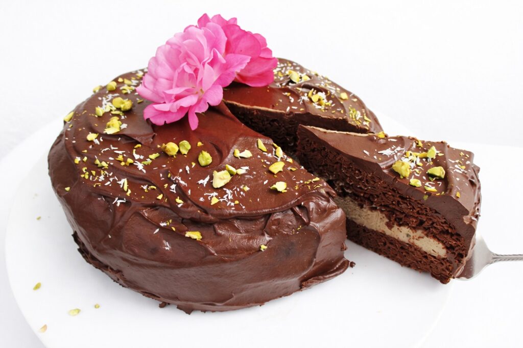 Chocolate Coffee Cake (Vegan, Gluten-free, No Refined Sugar) 3 Slicing into a rich vegan chocolate coffee cake