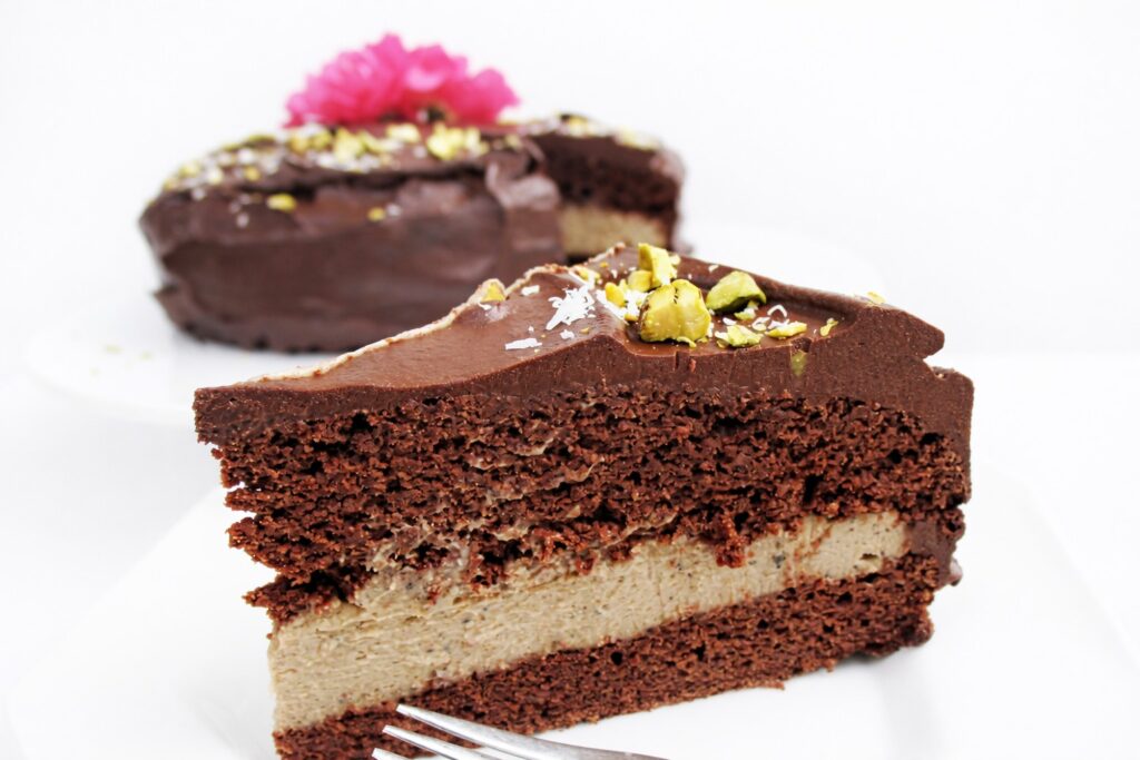 Chocolate Coffee Cake (Vegan, Gluten-free, No Refined Sugar) 5 Pouring vegan chocolate frosting over chilled coffee cake