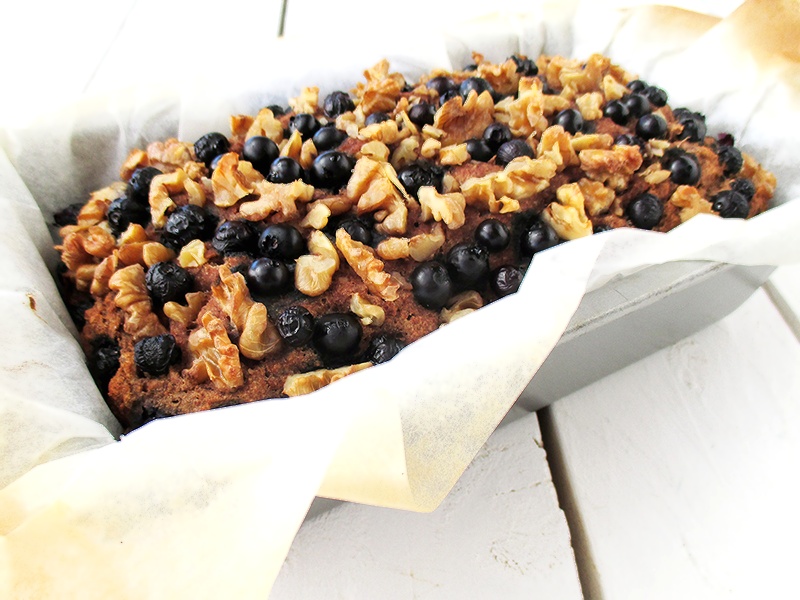 Blueberry walnut banana loaf, vegan and gluten-free, freshly baked in a loaf tin